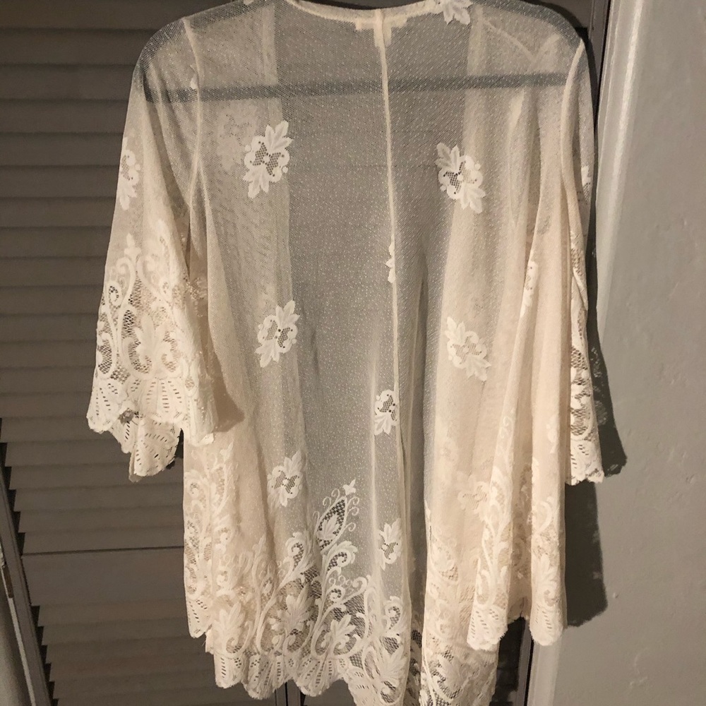 A white lace beach cover up